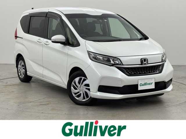 ホンダ フリード G 福岡県 2023(令5)年 1.6万km プラチナホワイトパール 純正ナビ（フルセグＴＶ）　/バックカメラ　/衝突軽減システム　/両側電動スライドドア　/レーダークルコン　/ビルトインＥＴＣ　/前後ドラレコ　/レーンキープ　/アイドリングストップ　/フロントガラス熱線スイッチ/ＡＡＣ