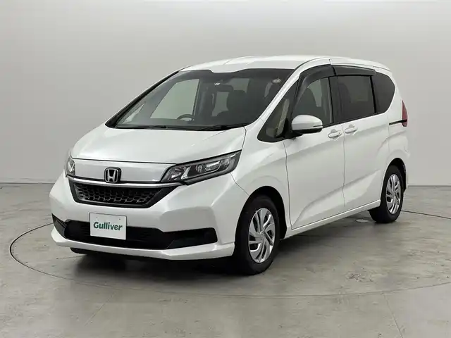 ホンダ フリード G 福岡県 2023(令5)年 1.6万km プラチナホワイトパール 純正ナビ（フルセグＴＶ）　/バックカメラ　/衝突軽減システム　/両側電動スライドドア　/レーダークルコン　/ビルトインＥＴＣ　/前後ドラレコ　/レーンキープ　/アイドリングストップ　/フロントガラス熱線スイッチ/ＡＡＣ