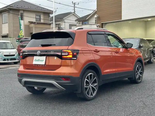 フォルクスワーゲン Ｔ－クロス TSI 1stプラス 埼玉県 2020(令2)年 4.5万km オレンジ 純正ナビ（Ｂｌｕｅｔｏｏｔｈ、ＣＤ、ＤＶＤ、フルセグＴＶ）/バックカメラ/ＥＴＣ2.0/追従走行有クルコン/スペアキー/ターボ/スマートキー/パーキングアシスト/ハーフレザーシート/純正アルミ/ＬＥＤヘッド/プッシュスタート/保証書/アイドリングストップ/オートエアコン/純正フロアマット/前後コーナーセンサー/横滑り防止装置/オートライト/ダブル＋サイドエアバッグ/USB入力端子