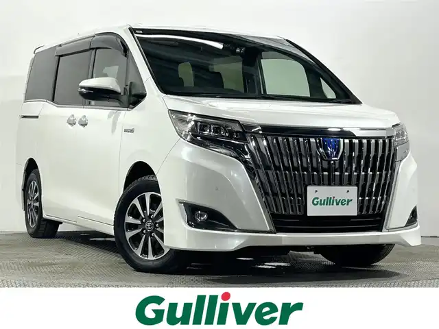トヨタ エスクァイア ハイブリッド Gi プレミアムパッケージ 大阪府 2019(令1)年 4.2万km ホワイトパールクリスタルシャイン 純正10incナビTV バックカメラ ハーフレザー シートヒーター ステアリングヒーター クルーズコントロール 衝突軽減ブレーキ レーンアシスト オートハイビーム 両側パワースライドドア 前後ドライブレコーダー ETC