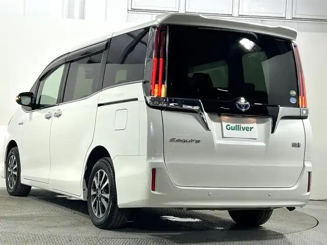 トヨタ エスクァイア ハイブリッド Gi プレミアムパッケージ 大阪府 2019(令1)年 4.2万km ホワイトパールクリスタルシャイン 純正10incナビTV バックカメラ ハーフレザー シートヒーター ステアリングヒーター クルーズコントロール 衝突軽減ブレーキ レーンアシスト オートハイビーム 両側パワースライドドア 前後ドライブレコーダー ETC