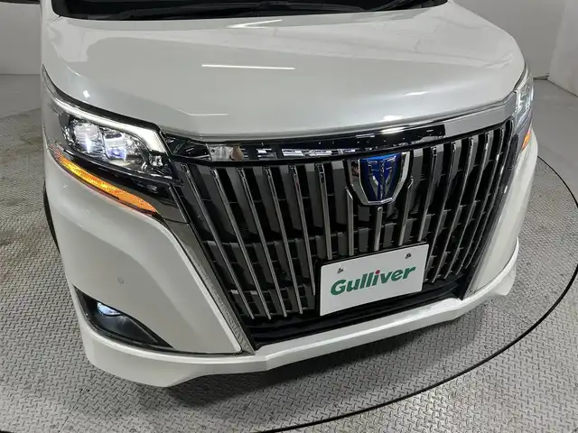 トヨタ エスクァイア ハイブリッド Gi プレミアムパッケージ 大阪府 2019(令1)年 4.2万km ホワイトパールクリスタルシャイン 純正10incナビTV バックカメラ ハーフレザー シートヒーター ステアリングヒーター クルーズコントロール 衝突軽減ブレーキ レーンアシスト オートハイビーム 両側パワースライドドア 前後ドライブレコーダー ETC