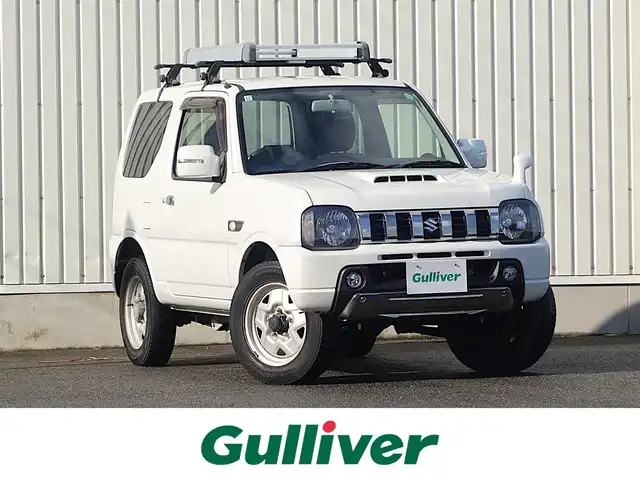 スズキ ジムニー ランドベンチャー 山形県 2015(平27)年 6.1万km パールホワイト パートタイム4WD/5MT/SDナビ/　　【CD DVD BT フルセグ USB MSV】/撥水シート/シートヒーター/ステアリングスイッチ/IC付ターボ/電動格納ウィンカーミラー/フォグランプ/リモコンキー/スペアキー/ETC