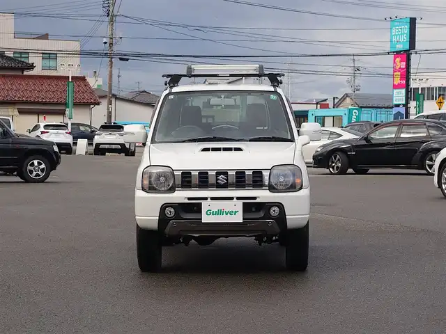 スズキ ジムニー ランドベンチャー 山形県 2015(平27)年 6.1万km パールホワイト パートタイム4WD/5MT/SDナビ/　　【CD DVD BT フルセグ USB MSV】/撥水シート/シートヒーター/ステアリングスイッチ/IC付ターボ/電動格納ウィンカーミラー/フォグランプ/リモコンキー/スペアキー/ETC