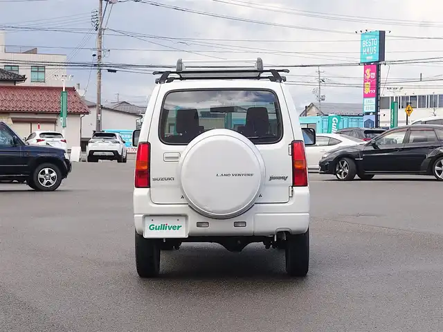 スズキ ジムニー ランドベンチャー 山形県 2015(平27)年 6.1万km パールホワイト パートタイム4WD/5MT/SDナビ/　　【CD DVD BT フルセグ USB MSV】/撥水シート/シートヒーター/ステアリングスイッチ/IC付ターボ/電動格納ウィンカーミラー/フォグランプ/リモコンキー/スペアキー/ETC