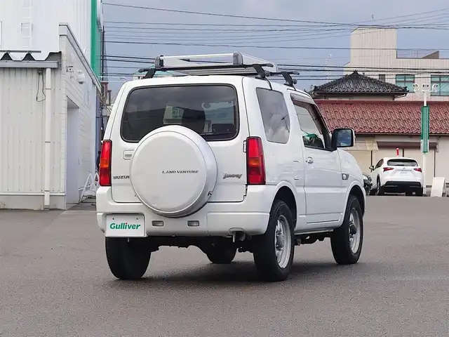 スズキ ジムニー ランドベンチャー 山形県 2015(平27)年 6.1万km パールホワイト パートタイム4WD/5MT/SDナビ/　　【CD DVD BT フルセグ USB MSV】/撥水シート/シートヒーター/ステアリングスイッチ/IC付ターボ/電動格納ウィンカーミラー/フォグランプ/リモコンキー/スペアキー/ETC