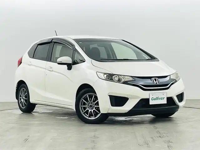 ホンダ フィット 13G Lパッケージ 福島県 2014(平26)年 10.9万km プレミアムホワイトパール 社外ナビゲーション　/【ＣＤ/ＤＶＤ/フルセグＴＶ/FＭ/ＡＭ/Ｂｌｕｅｔｏｏｔｈ】/バックカメラ　/スマートキー　/・プッシュスタート　/オートライト　/純正フロアマット　/横滑り防止装置　/ドアバイザー/取扱説明書　/冬タイヤ積み込み