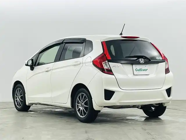 ホンダ フィット 13G Lパッケージ 福島県 2014(平26)年 10.9万km プレミアムホワイトパール 社外ナビゲーション　/【ＣＤ/ＤＶＤ/フルセグＴＶ/FＭ/ＡＭ/Ｂｌｕｅｔｏｏｔｈ】/バックカメラ　/スマートキー　/・プッシュスタート　/オートライト　/純正フロアマット　/横滑り防止装置　/ドアバイザー/取扱説明書　/冬タイヤ積み込み
