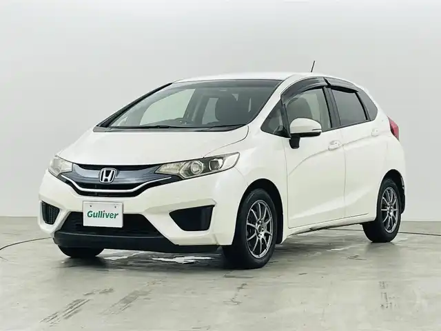 ホンダ フィット 13G Lパッケージ 福島県 2014(平26)年 10.9万km プレミアムホワイトパール 社外ナビゲーション　/【ＣＤ/ＤＶＤ/フルセグＴＶ/FＭ/ＡＭ/Ｂｌｕｅｔｏｏｔｈ】/バックカメラ　/スマートキー　/・プッシュスタート　/オートライト　/純正フロアマット　/横滑り防止装置　/ドアバイザー/取扱説明書　/冬タイヤ積み込み