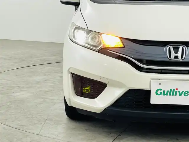 ホンダ フィット 13G Lパッケージ 福島県 2014(平26)年 10.9万km プレミアムホワイトパール 社外ナビゲーション　/【ＣＤ/ＤＶＤ/フルセグＴＶ/FＭ/ＡＭ/Ｂｌｕｅｔｏｏｔｈ】/バックカメラ　/スマートキー　/・プッシュスタート　/オートライト　/純正フロアマット　/横滑り防止装置　/ドアバイザー/取扱説明書　/冬タイヤ積み込み