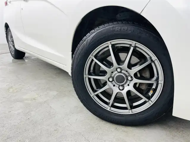 ホンダ フィット 13G Lパッケージ 福島県 2014(平26)年 10.9万km プレミアムホワイトパール 社外ナビゲーション　/【ＣＤ/ＤＶＤ/フルセグＴＶ/FＭ/ＡＭ/Ｂｌｕｅｔｏｏｔｈ】/バックカメラ　/スマートキー　/・プッシュスタート　/オートライト　/純正フロアマット　/横滑り防止装置　/ドアバイザー/取扱説明書　/冬タイヤ積み込み