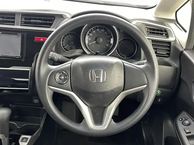 ホンダ フィット 13G Lパッケージ 福島県 2014(平26)年 10.9万km プレミアムホワイトパール 社外ナビゲーション　/【ＣＤ/ＤＶＤ/フルセグＴＶ/FＭ/ＡＭ/Ｂｌｕｅｔｏｏｔｈ】/バックカメラ　/スマートキー　/・プッシュスタート　/オートライト　/純正フロアマット　/横滑り防止装置　/ドアバイザー/取扱説明書　/冬タイヤ積み込み