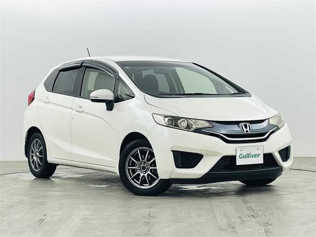 ホンダ フィット 13G Lパッケージ 福島県 2014(平26)年 10.9万km プレミアムホワイトパール 社外ナビゲーション　/【ＣＤ/ＤＶＤ/フルセグＴＶ/FＭ/ＡＭ/Ｂｌｕｅｔｏｏｔｈ】/バックカメラ　/スマートキー　/・プッシュスタート　/オートライト　/純正フロアマット　/横滑り防止装置　/ドアバイザー/取扱説明書　/冬タイヤ積み込み
