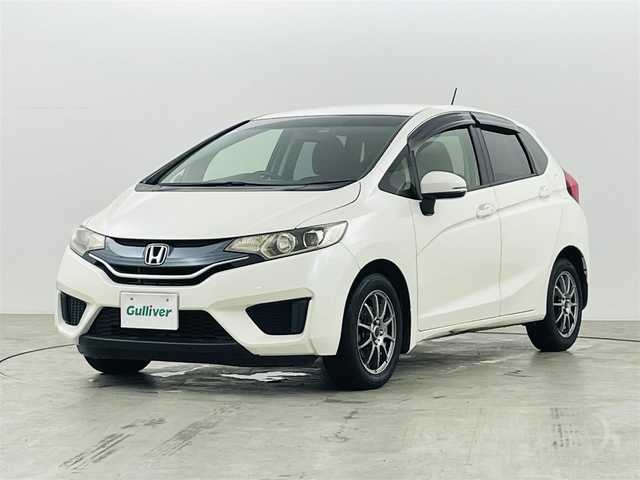 ホンダ フィット 13G Lパッケージ 福島県 2014(平26)年 10.9万km プレミアムホワイトパール 社外ナビゲーション　/【ＣＤ/ＤＶＤ/フルセグＴＶ/FＭ/ＡＭ/Ｂｌｕｅｔｏｏｔｈ】/バックカメラ　/スマートキー　/・プッシュスタート　/オートライト　/純正フロアマット　/横滑り防止装置　/ドアバイザー/取扱説明書　/冬タイヤ積み込み