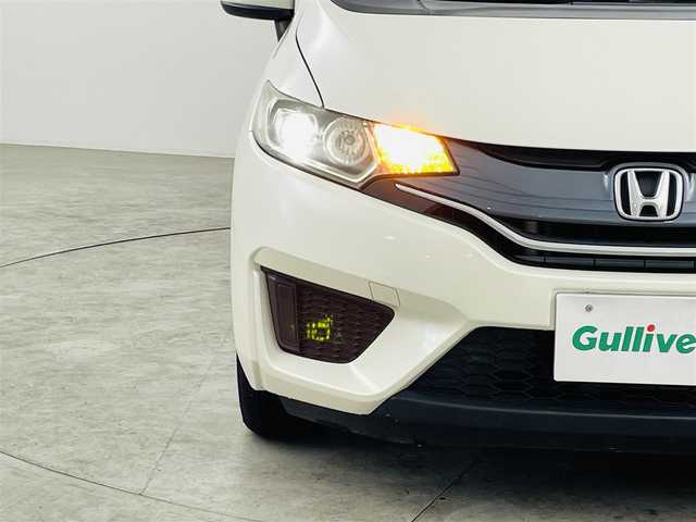 ホンダ フィット 13G Lパッケージ 福島県 2014(平26)年 10.9万km プレミアムホワイトパール 社外ナビゲーション　/【ＣＤ/ＤＶＤ/フルセグＴＶ/FＭ/ＡＭ/Ｂｌｕｅｔｏｏｔｈ】/バックカメラ　/スマートキー　/・プッシュスタート　/オートライト　/純正フロアマット　/横滑り防止装置　/ドアバイザー/取扱説明書　/冬タイヤ積み込み
