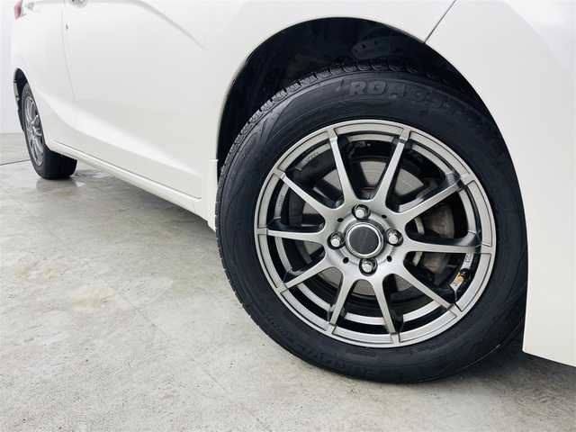 ホンダ フィット 13G Lパッケージ 福島県 2014(平26)年 10.9万km プレミアムホワイトパール 社外ナビゲーション　/【ＣＤ/ＤＶＤ/フルセグＴＶ/FＭ/ＡＭ/Ｂｌｕｅｔｏｏｔｈ】/バックカメラ　/スマートキー　/・プッシュスタート　/オートライト　/純正フロアマット　/横滑り防止装置　/ドアバイザー/取扱説明書　/冬タイヤ積み込み