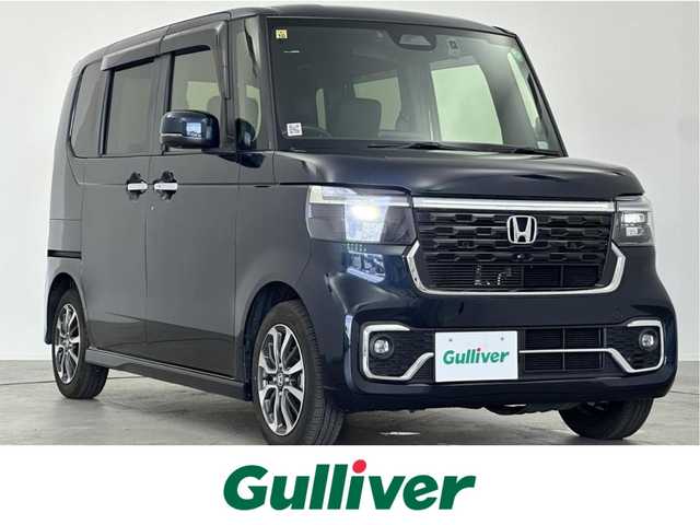 ホンダ Ｎ ＢＯＸ カスタム 愛知県 2023(令5)年 1.1万km ミッドナイトブルービームM 純正DA（Bluetooth、AM、FM）/ETC/Bカメラ/ACC/両側パワスラドア/LEDヘッドライト/電子パーキング/オートホールド/オートライト/衝突軽減ブレーキ/レーンキープアシスト/ドラレコ前後/USB/チップアップシート/横滑り防止装置/三点エアバック/ISOFIX