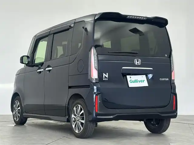 ホンダ Ｎ ＢＯＸ カスタム 愛知県 2023(令5)年 1.1万km ミッドナイトブルービームM 純正DA（Bluetooth、AM、FM）/ETC/Bカメラ/ACC/両側パワスラドア/LEDヘッドライト/電子パーキング/オートホールド/オートライト/衝突軽減ブレーキ/レーンキープアシスト/ドラレコ前後/USB/チップアップシート/横滑り防止装置/三点エアバック/ISOFIX