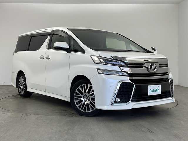 トヨタ ヴェルファイア Z Gエディション 兵庫県 2016(平28)年 6万km ホワイトパールクリスタルシャイン ・純正ナビ/Bluetooth/CD/DVD/TV/SD/・バックカメラ/・両側パワースライドドア/・パワーバックドア/・ビルトインETC/・前後コーナーセンサー/・クルーズコントロール/・ハーフレザーシート/・スマートキー/・nanoe/・前席パワーシート/・純正18インチアルミホイール/・LEDオートライト/・LEDフォグランプ/・横滑り防止装置/・盗難防止装置/・革巻きステアリング/・ステアリングリモコン/・ステアリングヒーター/・電動パーキングブレーキ/・メモリー付きパワーシート（D席）