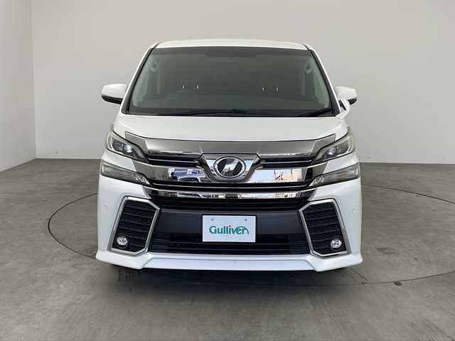 トヨタ ヴェルファイア Z Gエディション 兵庫県 2016(平28)年 6万km ホワイトパールクリスタルシャイン ・純正ナビ/Bluetooth/CD/DVD/TV/SD/・バックカメラ/・両側パワースライドドア/・パワーバックドア/・ビルトインETC/・前後コーナーセンサー/・クルーズコントロール/・ハーフレザーシート/・スマートキー/・nanoe/・前席パワーシート/・純正18インチアルミホイール/・LEDオートライト/・LEDフォグランプ/・横滑り防止装置/・盗難防止装置/・革巻きステアリング/・ステアリングリモコン/・ステアリングヒーター/・電動パーキングブレーキ/・メモリー付きパワーシート（D席）