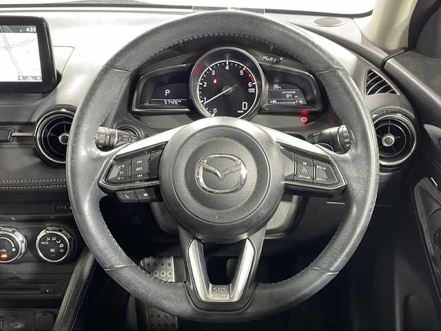 マツダ デミオ XD ツーリング 広島県 2016(平28)年 5.8万km ソニックシルバーM 禁煙車/純正ナビ/バックカメラ/シートヒーター/ヘッドアップディスプレイ/ブラインドスポットモニター/クルーズコントロール/パドルシフト/ＥＴＣ/衝突被害軽減/オートハイビーム/レーンキープ/フォグランプ/ＬＥＤヘッドライト/社外16インチアルミホイール(185/60/R16)/エアバッグ(運転席/助手席/サイド/カーテン)