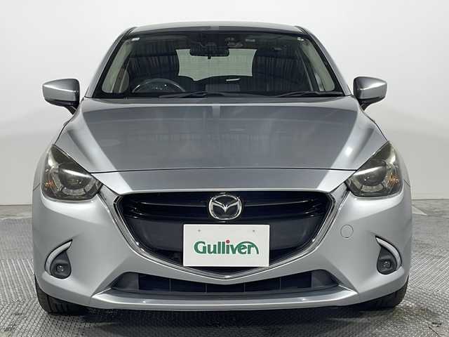 マツダ デミオ XD ツーリング 広島県 2016(平28)年 5.8万km ソニックシルバーM 禁煙車/純正ナビ/バックカメラ/シートヒーター/ヘッドアップディスプレイ/ブラインドスポットモニター/クルーズコントロール/パドルシフト/ＥＴＣ/衝突被害軽減/オートハイビーム/レーンキープ/フォグランプ/ＬＥＤヘッドライト/社外16インチアルミホイール(185/60/R16)/エアバッグ(運転席/助手席/サイド/カーテン)