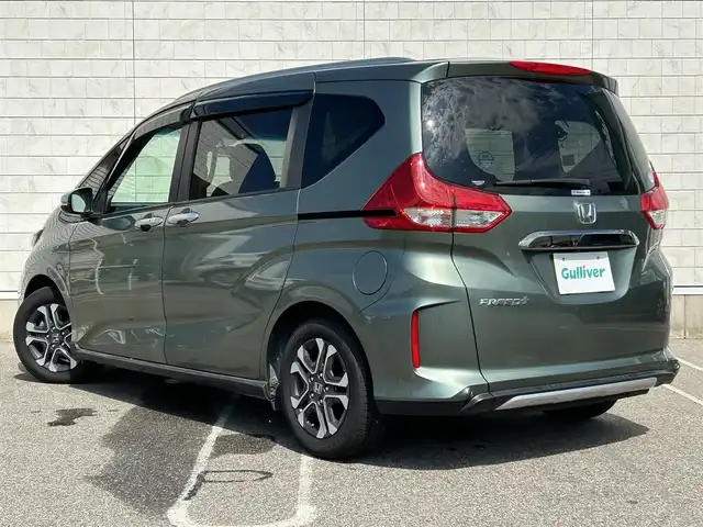 ホンダ フリード＋ クロスター ホンダセンシング 新潟県 2020(令2)年 2.5万km シルバーミストグリーンM 衝突軽減/社外ナビ/(AM/FM/CD/DVD/BT/フルセグ)/バックカメラ/ETC/両側パワースライドドア/アダプティブクルーズコントロール/アイドリングストップ/コーナーセンサー(後)/ハーフレザーシート/シートヒーター/革巻きステアリング/ステアリングスイッチ/ルーフレール/AUTOライト/LEDヘッドライト/フォグランプ/横滑り防止/プッシュスタート/スマートキー