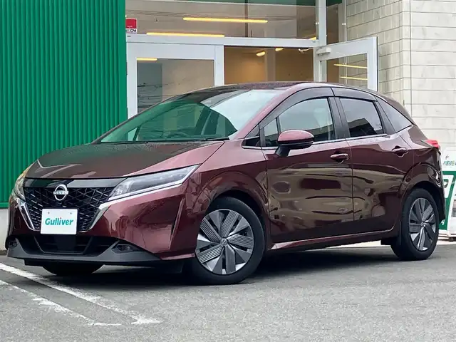 日産 ノート X 静岡県 2022(令4)年 1.1万km バーガンディー 純正9インチナビ(BT/フルセグ)/全方位カメラ/純正ドライブレコーダー/ETC2.0/ワンオーナー/エンジンスタートボタン/パワーステアリング/パワーウィンドウ/取扱説明書/アイドリングストップ/スマートキー/スペアキー１本/オートエアコン/USB入力端子/フロアマット/ABS/横滑り防止装置/コーナーセンサー前後/オートライト/オートマチックハイビーム/LEDヘッドライト/W+サイドエアバッグ/衝突軽減システム/ワイヤレス充電/デジタルインナーミラー/HDMI接続/BSM