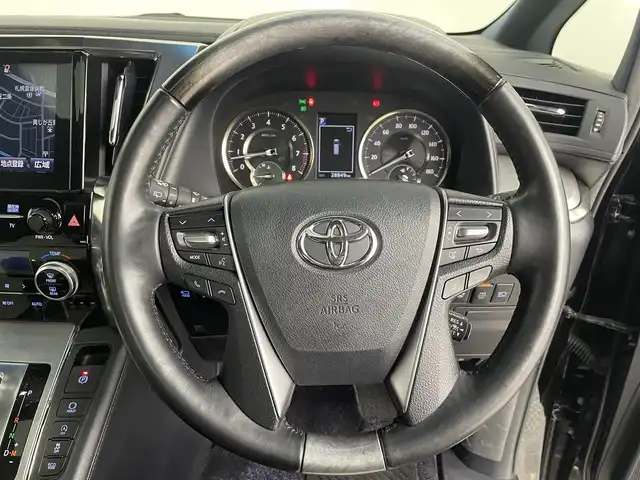 トヨタ アルファード エグゼクティブ ラウンジ S 道央・札幌 2018(平30)年 2.9万km ブラック ・メーカーナビ/・フルセグ/BT/CD/DVD/USB/HDMI/・全方位カメラ/・JBLサウンド/・フリップダウンモニター/・両側パワースライドドア/・TRDエアロ/・パワーバックドア/・パワーシート/・シートベンチレーション/・シートメモリ/・ステアリングヒーター/・衝突被害軽減ブレーキ/・レーンキープアシスト/・レーダークルーズコントロール/・オートハイビーム/・ダブルサンルーフ/・デジタルインナーミラー/・ドライブレコーダー/・クレンツェ20インチAW