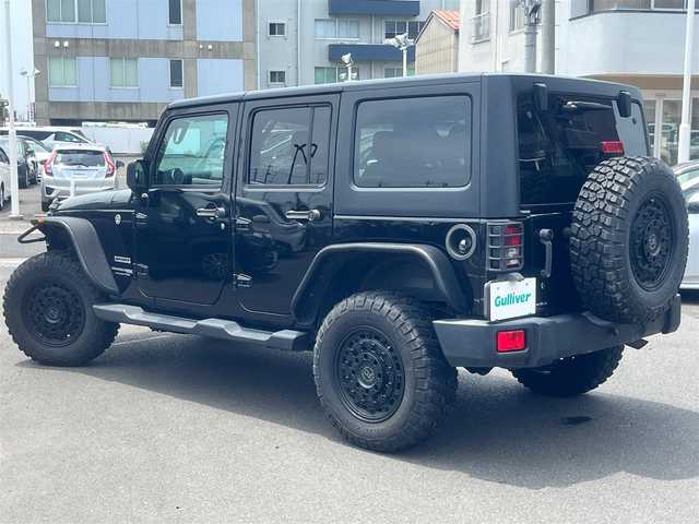 クライスラー・ジープ ジープ ラングラー アンリミテッド スポーツ 島根県 2018(平30)年 6.1万km ブラック 4WD/社外メモリナビ　/フルセグＴＶ　/ＤＶＤ再生　/Ｂｌｕｅｔｏｏｔｈ接続　/ＥＴＣ　/バックカメラ /フリーダムトップ 3ピースモジュラーハードトップ/社外Black Rhinoアルミホイール/社外バンパーガード/社外サイドステップ/社外オーバーフェンダー　/横滑り防止装置　/クルーズコントロール　　　/純正フロアマット