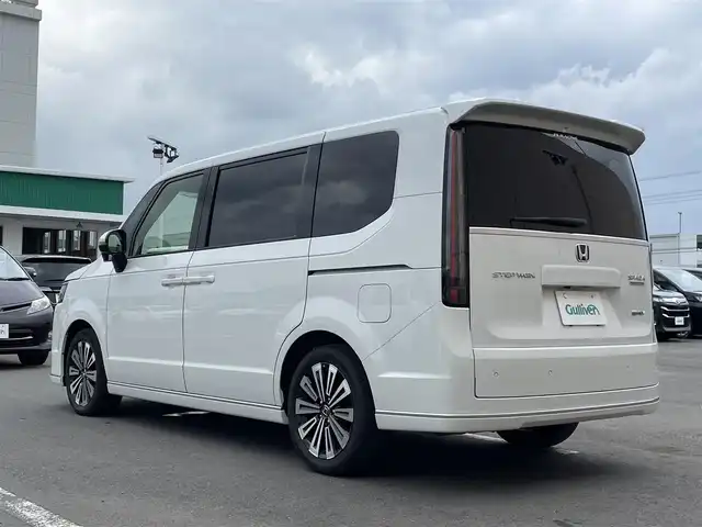 ホンダ ステップワゴン スパーダ eHEV プレミアムライン 東京都 2024(令6)年 2.9万km プラチナホワイトパール １１．４型ホンダコネクトナビ＆フルセグ　/・AppleCarPlay＆AndroidAuto/・BluetoothAudio/・CD/SD/DVD/AM/FM/USB/アラウンドビューモニター/両側パワースライドドア　/パワーバックドア　/ブラインドスポットモニター　/ホンダセンシング/（安全運転支援システム）/・衝突軽減ブレーキ/・後方誤発進抑制機能/・歩行者事故低減ステアリング/・渋滞追従機能付クルーズコントロール/・車線維持支援システム/・先行者発進お知らせ機能/・誤発進抑制/・近距離衝突軽減ブレーキ/・標識認識機能/撥水ファブリックコンビシート /・前席シートヒーター/・キャプテンシート /ＬＥＤヘッドライト /シートバックテーブル/ビルトインETC/プッシュエンジンスタート/スマートキー