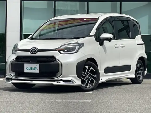 トヨタ シエンタ ハイブリッド Z 和歌山県 2023(令5)年 0.9万km ホワイトパールクリスタルシャイン 純正10.5インチナビ/バックカメラ/フルセグTV/BT/USB/衝突軽減ブレーキ/レーンキープアシスト/ブラインドスポットモニター/レーダークルコン/オートライト/前後コーナーセンサー/モデリスタエアロ/前後ドラレコ/ビルトインETC2.0/両側パワスラ/１００V充電/ステアリングヒーター/ステアリングリモコン