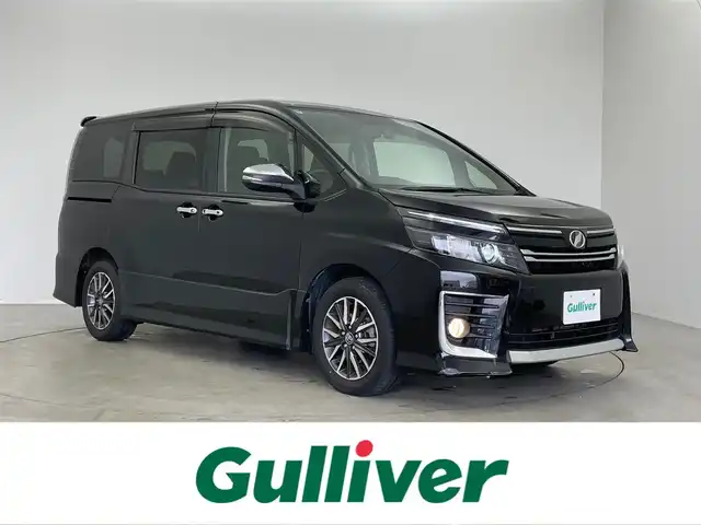 トヨタ ヴォクシー ZS 埼玉県 2014(平26)年 6.9万km ブラック 純正１０インチナビ　フリップダウンモニター　バックカメラ　ビルトインＥＴＣ　前後ドライブレコーダー　セーフティセンス　スマートキー　純正アルミホイール　オートライト　ＨＩＤライト　地デジフルセグ