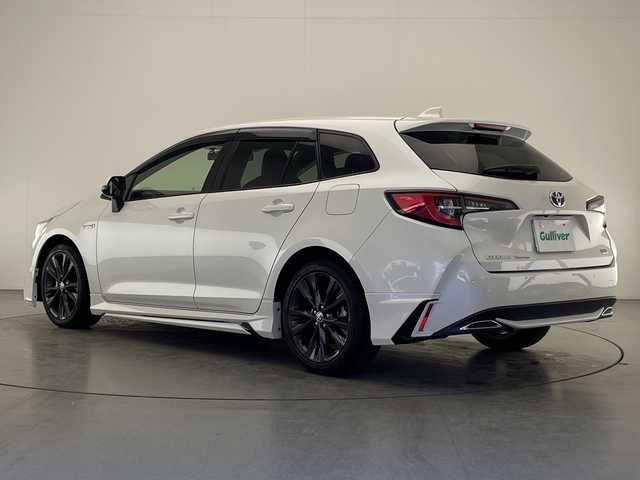 トヨタ カローラツーリング ハイブリッド ダブルバイビー 宮崎県 2019(令1)年 4.2万km ホワイトパールクリスタルシャイン モデリスタフルエアロ/Toyota Safety Sense/〇プリクラシュセーフティ/〇レーントレーシングアシスト/〇ブラインドスポットモニター/〇リアクロストラフィックアラート/〇パーキングサポートブレーキ/〇ロードサインアシスト/〇クリアランスソナー/〇オートマチックハイビーム/〇レーダークルーズコントロール/〇先行車発進告知/純正9インチディスプレイオーディオ/ナビ機能/フルセグTV/バックカメラ/ハーフレザーシート/シートヒーター/ステアリングヒーター/LEDヘッドライト/ビルトインETC/純正17インチAW/前後ドライブレコーダー