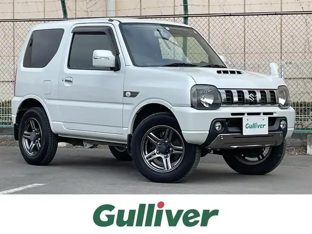 スズキ ジムニー ランドベンチャー 東京都 2015(平27)年 3.2万km パールホワイト ４ＷＤ　/５Ｆ　/純正ナビ　/フルセグＴＶ　/シートヒーター　/ミラー型前後ドラレコ　/合皮シート　/純正フロアマット　/ドアバイザー　/純正１６インチＡＷ　/Ｂｌｕｅｔｏｏｔｈ　/禁煙
