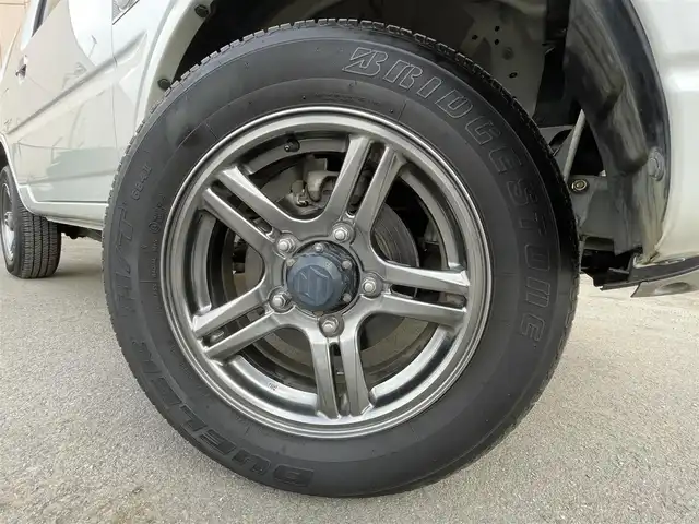 スズキ ジムニー ランドベンチャー 東京都 2015(平27)年 3.2万km パールホワイト ４ＷＤ　/５Ｆ　/純正ナビ　/フルセグＴＶ　/シートヒーター　/ミラー型前後ドラレコ　/合皮シート　/純正フロアマット　/ドアバイザー　/純正１６インチＡＷ　/Ｂｌｕｅｔｏｏｔｈ　/禁煙