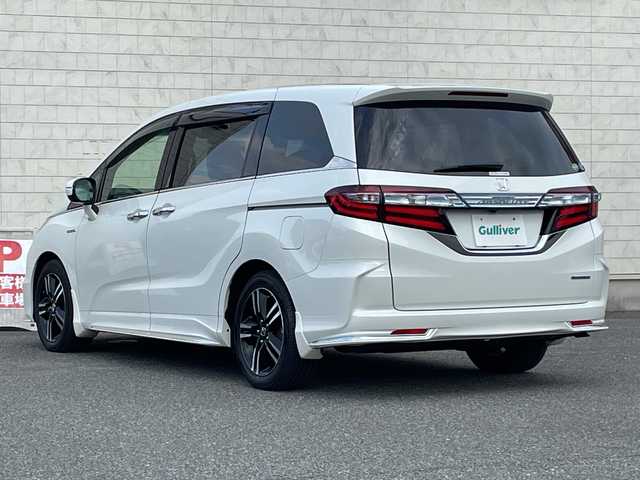 ホンダ オデッセイ ハイブリッド アブソルートセンシングEXパック 山口県 2017(平29)年 7万km ホワイトオーキッドパール ホンダセンシング/レーンキープアシスト/純正ナビ/CD/SD/DVD/BT/iPod/ブラインドスポットモニター/アクティブコーナーリングライト/パワーシート/ハーフレザーシート/バックカメラ/両側パワースライドドア/デジタルインナーミラー/前後ドライブレコーダー/純正フロアマット/電動格納ミラー