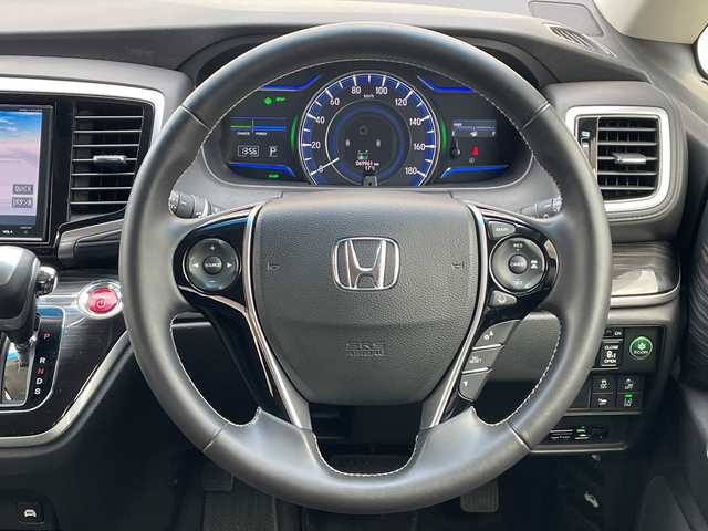 ホンダ オデッセイ ハイブリッド アブソルートセンシングEXパック 山口県 2017(平29)年 7万km ホワイトオーキッドパール ホンダセンシング/レーンキープアシスト/純正ナビ/CD/SD/DVD/BT/iPod/ブラインドスポットモニター/アクティブコーナーリングライト/パワーシート/ハーフレザーシート/バックカメラ/両側パワースライドドア/デジタルインナーミラー/前後ドライブレコーダー/純正フロアマット/電動格納ミラー