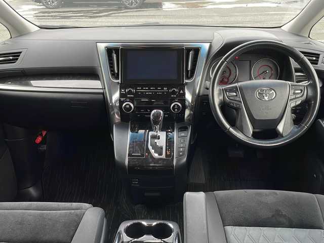 トヨタ ヴェルファイア Z Aエディション 岩手県 2019(平31)年 6.5万km ホワイトパールクリスタルシャイン 純正ナビ(CD/DVD/SD/USB/AUX/ラジオ/BT)/JBLプレミアムサウンド/パノラミックビューモニター/フルセグテレビ/両側パワースライドドア/デジタルインナーミラー/プリクラッシュセーフティ/レーントレーシングアシスト/レーダークルーズコントロール/ブラインドスポットモニター/オートマチックハイビーム/コーナーセンサー/前後ドライブレコーダー/ビルトインETC(2.0)/LEDヘッドライト/フォグランプ/助手席/2列目オットマン/純正18inアルミホイール/スマートキー/ステアリングスイッチ/電動格納ミラー/ウィンカーミラー/ドアバイザー