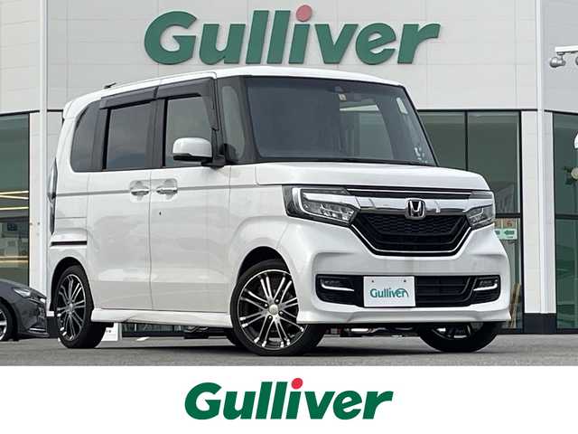ホンダ Ｎ ＢＯＸ カスタム G L ターボ ホンダセンシング 佐賀県 2019(令1)年 6万km プラチナホワイトパール 純正8型SDナビ(フルセグTV/CD/DVD/BT)　/ホンダセンシング/アダプティブクルーズコントロール/衝突被害軽減システム　/先行車発進お知らせ機能　/標識読み取り機能　/前後コーナーセンサー　/パドルシフト　/バックカメラ　/両側パワースライドドア　/ETC　/ISOFIX　/USBポート/シガーソケット　/後席サンシェイド/電格ミラー/ECON/現状サマー(純正AW)(165/50/R16)/ROADCRUZA SportsV1
