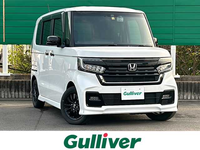 ホンダ Ｎ ＢＯＸ カスタム L スタイル+ブラック 茨城県 2022(令4)年 2.7万km プラチナホワイトパール 特別仕様車/純正8インチプレミアムインターナビ/フルセグTV/バックモニター/Bluetooth/両側パワースライドドア/Honda SENSING/オートリトラミラー/アレルクリーンプラスシート/プラズマクラスター技術搭載/フルオート・エアコンディショナー/前席用i-サイドエアバッグシステム/＋サイドカーテンエアバッグシステム(前席/後席対応)/運転席＆助手席シートバックテーブル/運転席＆助手席シートヒーター/純正ブラック塗装 14インチアルミホイール/本革巻ステアリングホイール/ETC/スペアキーあり