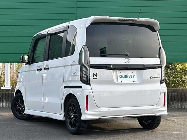 ホンダ Ｎ ＢＯＸ カスタム L スタイル+ブラック 茨城県 2022(令4)年 2.7万km プラチナホワイトパール 特別仕様車/純正8インチプレミアムインターナビ/フルセグTV/バックモニター/Bluetooth/両側パワースライドドア/Honda SENSING/オートリトラミラー/アレルクリーンプラスシート/プラズマクラスター技術搭載/フルオート・エアコンディショナー/前席用i-サイドエアバッグシステム/＋サイドカーテンエアバッグシステム(前席/後席対応)/運転席＆助手席シートバックテーブル/運転席＆助手席シートヒーター/純正ブラック塗装 14インチアルミホイール/本革巻ステアリングホイール/ETC/スペアキーあり