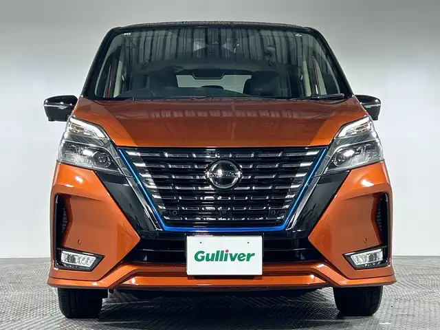 日産 セレナ e－パワー ハイウェイスター G 神奈川県 2021(令3)年 2.4万km サンライズオレンジ/ダイヤモンドブラック 純正10型SDナビゲーション/AM FM Bluetooth フルセグ CD DVD SD/アラウンドビューモニター/両側パワースライドドア/純正フリップダウンモニター/プロパイロット/全方位運転支援システム/インテリジェントエマージェンシーブレーキ/踏み間違い衝突防止アシスト/車線逸脱防止支援システム/後側方衝突防止支援システム/標識検知機能/前方衝突予測警報/車線逸脱警報/後後方車両検知警報/後退時車両検知警報/レザーシート/前席シートヒーター/ステアリングリモコン/ステアリングヒーター/ビルトインETC/前方ドライブレコーダー/純正フロアマット/デジタルインナーミラー/純正16インチアルミホイル/LEDヘッドライト/オートライト/オートマチックハイビーム/インテリジェントキー/スペアキー/ドアバイザー