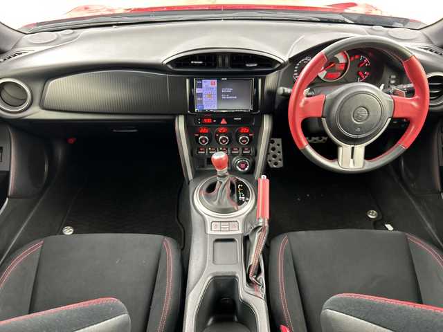 トヨタ ８６ GT 愛知県 2014(平26)年 3.1万km ライトニングレッド 禁煙車/7インチメモリナビ/（AM/FM/フルセグTV/CD/DVD)/バックカメラ/ETC/パドルシフト/純正17インチアルミホイール/スマートキー/スペアキーあり/プッシュスタート/横滑り防止装置/オートライト/純正フロアマット