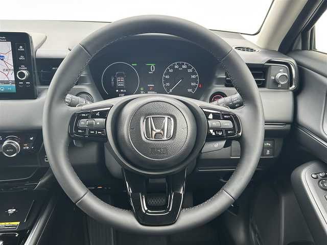 ホンダ ヴェゼル ハイブリッド e:HEV Z 群馬県 2025(令7)年 0.1万km未満 プレミアムサンライトホワイトパール ワンオーナー/純正ナビ/　(AM/FM/TV/BT/USB)/パワーバックドア/ハンズフリーアクセスパワーテールゲート/バックカメラ/ホンダセンシング/路外逸脱抑制機能/踏み間違い衝突軽減システム/衝突軽減ブレーキ/ブラインドスポットモニター/コーナーセンサー/ヒルディセントコントロール/横滑り防止機能/レーダークルーズコントロール/ETC2.0/AUTOライト/LEDヘッドライト/LEDフォグライト/前席シートヒーター/ステアリングヒーター/ステアリングリモコン/パドルシフト/置くだけ充電/シーケンシャルウィンカー/取扱説明書/保証書/スペアキー1つ