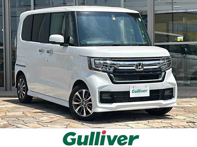 ホンダ Ｎ ＢＯＸ カスタム L 静岡県 2023(令5)年 1.5万km プラチナホワイトパール 純正9インチメモリナビ/・CD/・DVD/・フルセグTV/・Bluetooth/・USB/・AM/・FM/主要装備/・片側パワスラ/・衝突軽減/・レーンキープ/・追従クルコン/・コーナーセンサー後方/・バックカメラ/・ETC/・シートヒーターD+N席/・電動パーキングブレーキ/・純正フロアマット/・社外ドラレコ前後/・LEDオートライト/・オートハイビーム/・フォグランプ