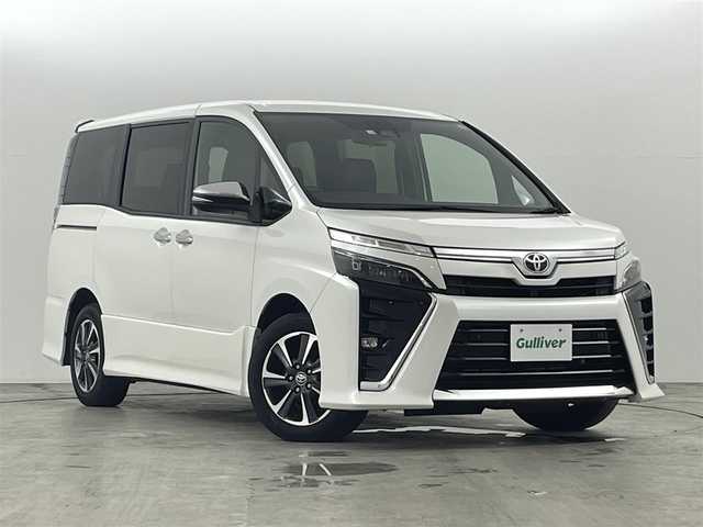 トヨタ ヴォクシー ZS 煌Ⅲ 福島県 2021(令3)年 2.7万km パール トヨタセーフティーセンス　/・PCS/・車線逸脱警報/・オートハイビーム/・クリアランスソナー/アルパインナビゲーション/【AM/FM/DVD/CD/Bluetooth/フルセグTV】　/バックカメラ　/ＥＴＣ　/ハーフレザーシート　/両側パワースライドドア　/クルーズコントロール　/プッシュスタート　/・スマートキー　/ＬＥＤライト　/・オートライト/純正フロアマット/ステアリングスイッチ/・革巻きステアリング/・チルトステアリング　/ドアバイザー