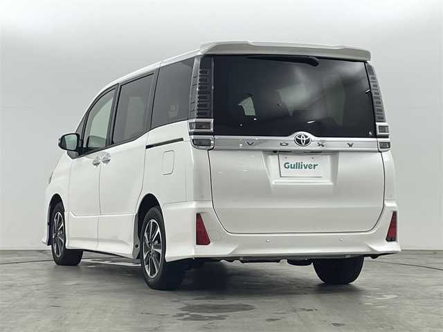 トヨタ ヴォクシー ZS 煌Ⅲ 福島県 2021(令3)年 2.7万km パール トヨタセーフティーセンス　/・PCS/・車線逸脱警報/・オートハイビーム/・クリアランスソナー/アルパインナビゲーション/【AM/FM/DVD/CD/Bluetooth/フルセグTV】　/バックカメラ　/ＥＴＣ　/ハーフレザーシート　/両側パワースライドドア　/クルーズコントロール　/プッシュスタート　/・スマートキー　/ＬＥＤライト　/・オートライト/純正フロアマット/ステアリングスイッチ/・革巻きステアリング/・チルトステアリング　/ドアバイザー