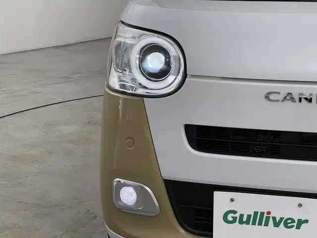 ダイハツ ムーヴ キャンバス ストライプス G 福岡県 2025(令7)年 0.1万km シャイニングホワイトパール/サンドベージュメタリック 純正９型ＤＡ（フルセグＴＶ）　/バックカメラ　/ワイヤレス充電　/ホッとカップホルダー　/コーナーセンサー　/衝突被害軽減ブレーキ　/レーンキープ　/先行車発進お知らせ　/両側電動スライドドア　/シートヒーター　/ＬＥＤヘッドライト