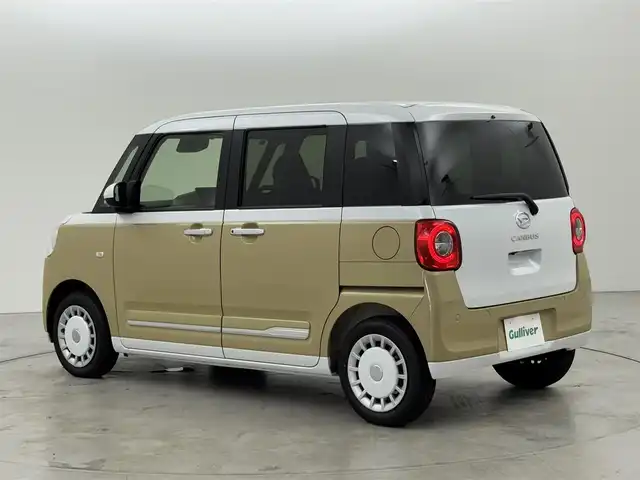 ダイハツ ムーヴ キャンバス ストライプス G 福岡県 2025(令7)年 0.1万km シャイニングホワイトパール/サンドベージュメタリック 純正９型ＤＡ（フルセグＴＶ）　/バックカメラ　/ワイヤレス充電　/ホッとカップホルダー　/コーナーセンサー　/衝突被害軽減ブレーキ　/レーンキープ　/先行車発進お知らせ　/両側電動スライドドア　/シートヒーター　/ＬＥＤヘッドライト